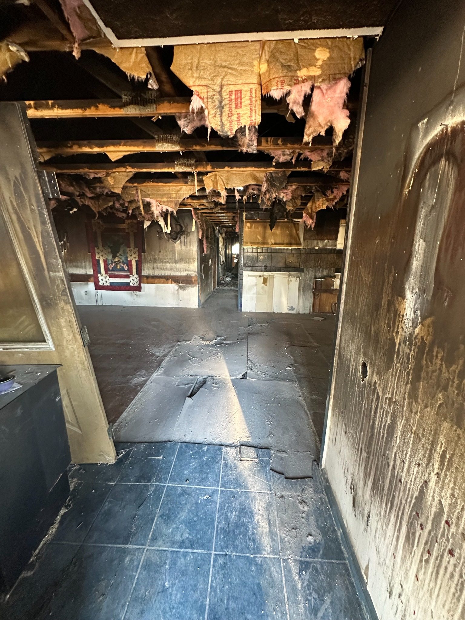 Fire-damaged interior — after