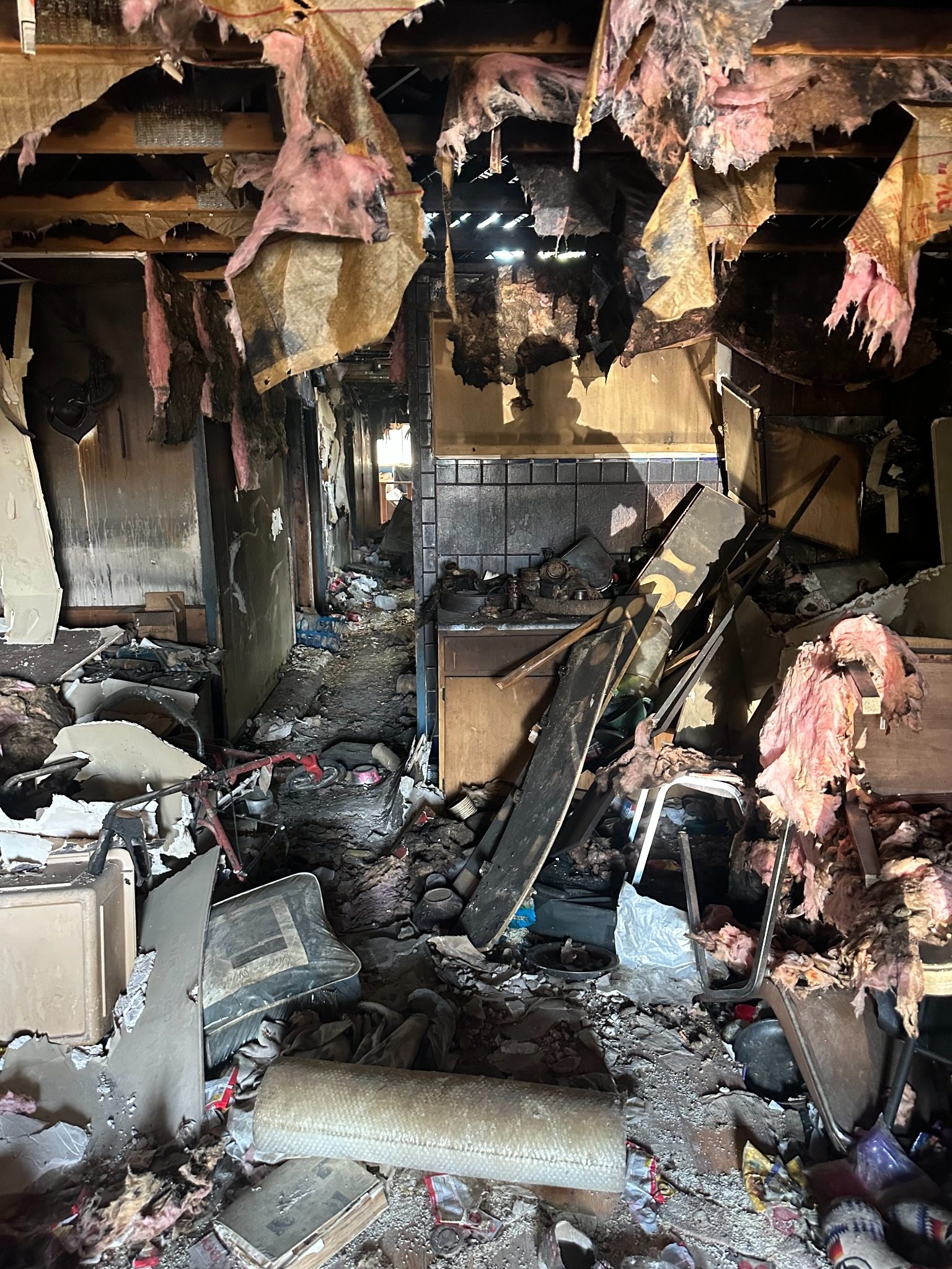 Fire-damaged interior — before